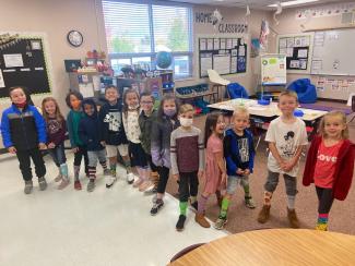 Mrs. Pickering's class showing off their socks