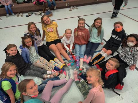 Students showing off their crazy socks.