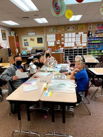 Third graders working on their haunted houses