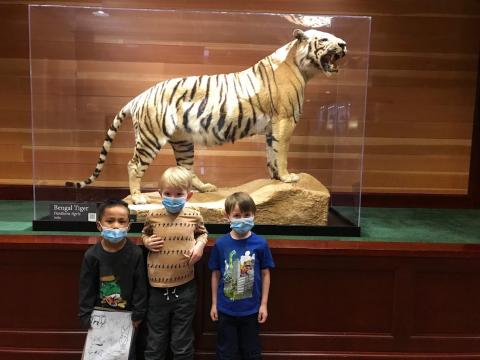 students with a bengal tiger