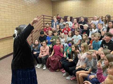 4th graders listening to the Native American Presentation